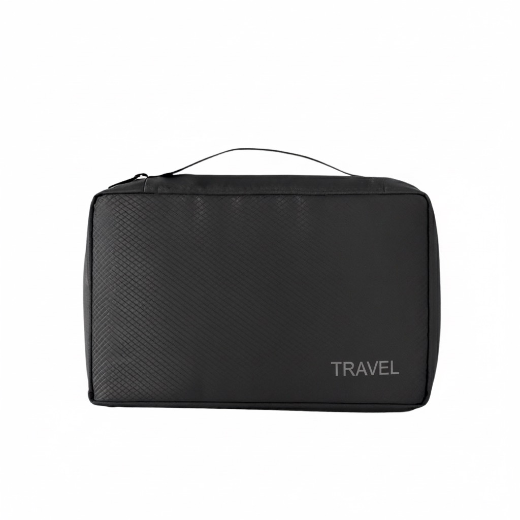 Small black packing cube close up